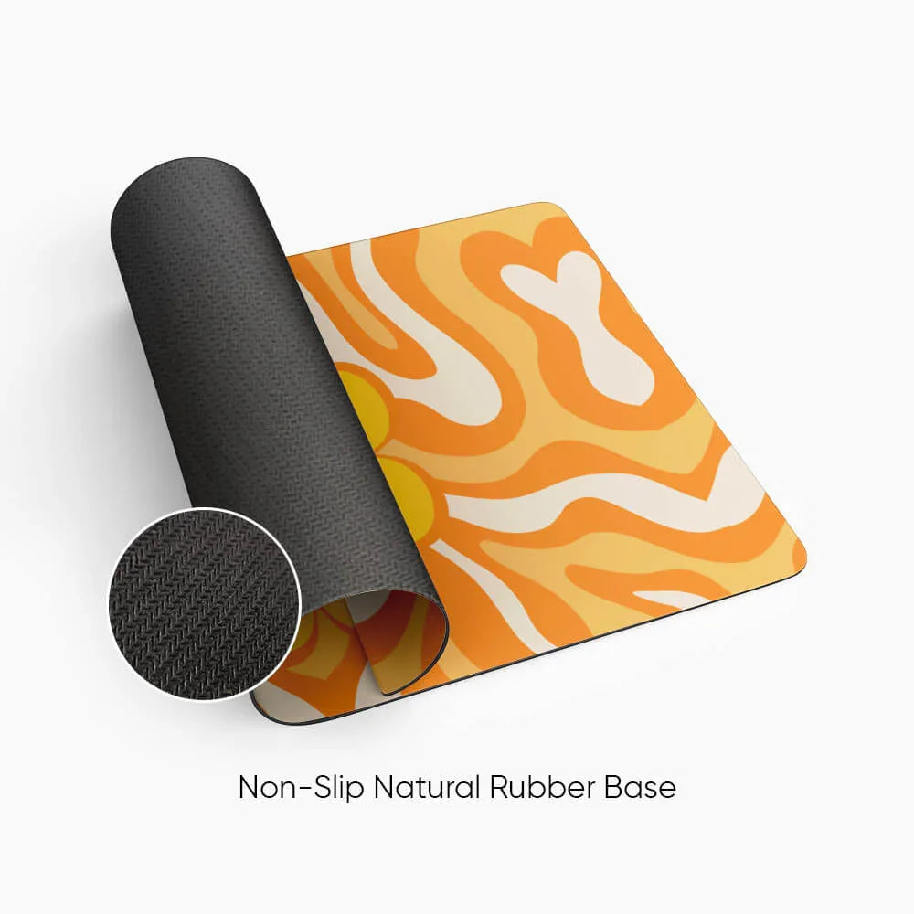 Orange desk mat with abstract wavy pattern and non-slip natural rubber base