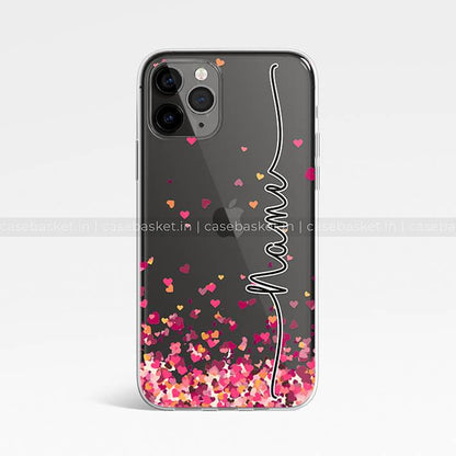 Clear phone case with pink and red heart confetti and customizable name text design.