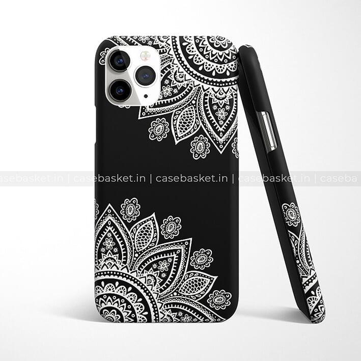 Black phone case with intricate white mandala floral pattern, compatible with iPhone.