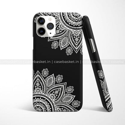 Black phone case with intricate white mandala floral pattern, compatible with iPhone.