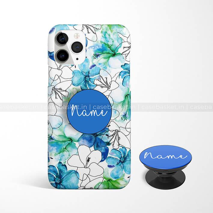 Floral phone case with blue and green watercolor flowers and personalized blue pop socket.