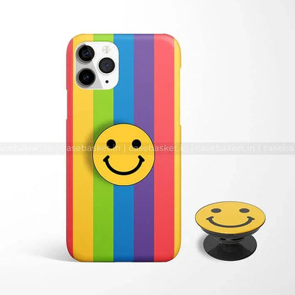 Rainbow striped phone case with smiley face design and matching phone grip for iPhone.