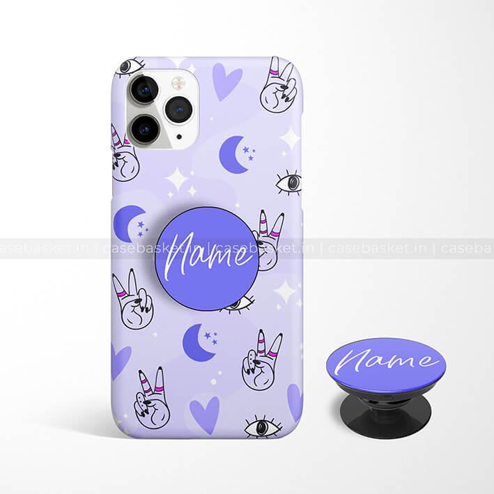 Purple phone case with peace hand signs, hearts, moons, eyes, and matching pop socket.