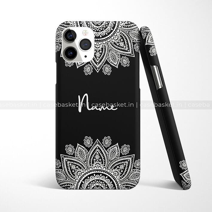 Black phone case with white mandala floral design and customizable name text, for iPhone.