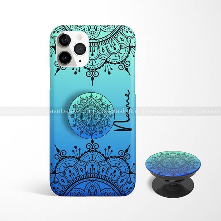 Blue gradient phone case with black mandala design and matching pop socket, compatible with iPhone.