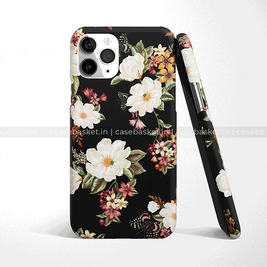 Black floral phone case with white and pink flower design, shown on smartphone