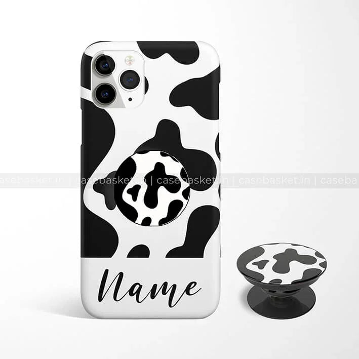 Black and white cow print phone case with matching pop socket and custom name text