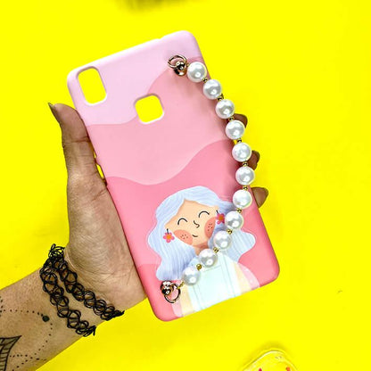 Pink cartoon girl phone case with pearl chain charm, held in hand on yellow background