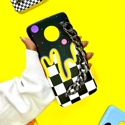 Checkerboard phone case with colorful drip design, chunky chain, and planets on yellow background