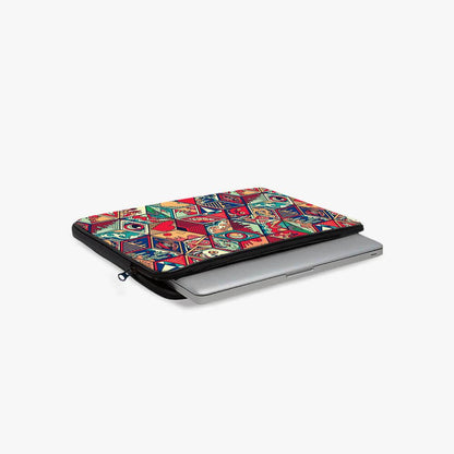 13-inch laptop sleeve with colorful geometric pattern, partially open with laptop inside