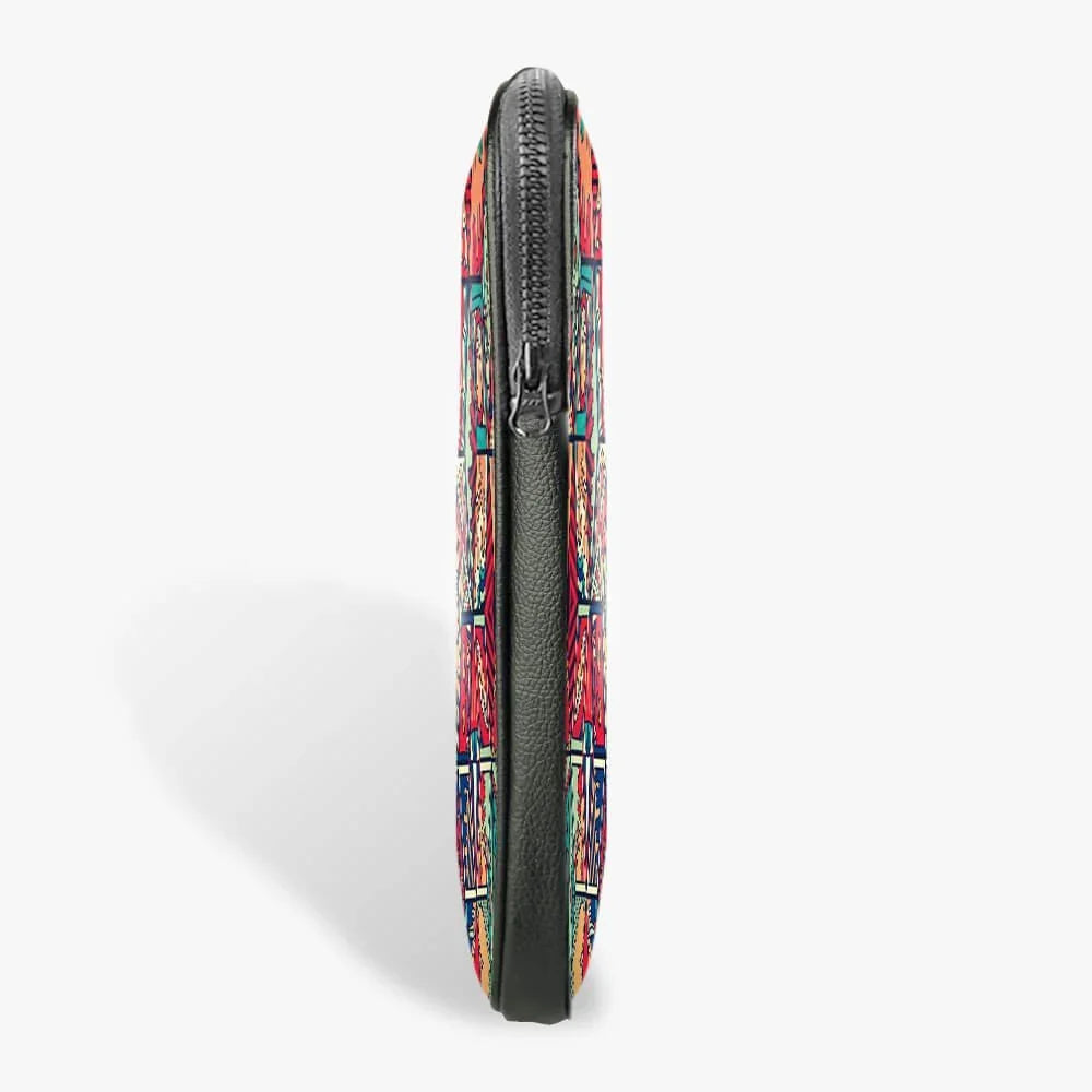 Side view of a slim 13-inch laptop sleeve with colorful geometric pattern and black zipper