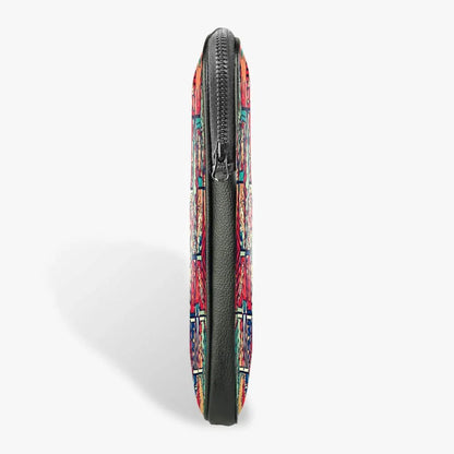 Side view of a slim 13-inch laptop sleeve with colorful geometric pattern and black zipper