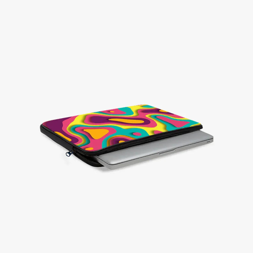 Colorful abstract laptop sleeve with zipper, partially open showing silver laptop