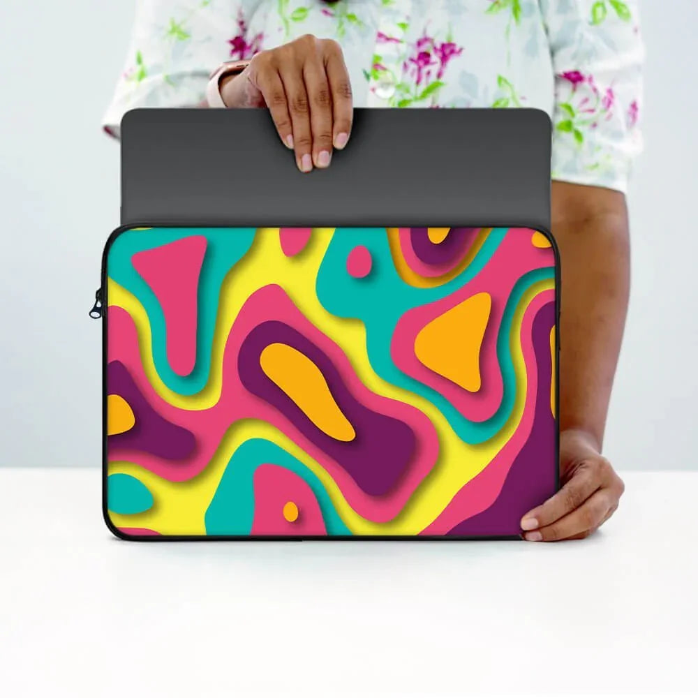 Person holding colorful abstract pattern laptop sleeve with zipper, 13-inch size