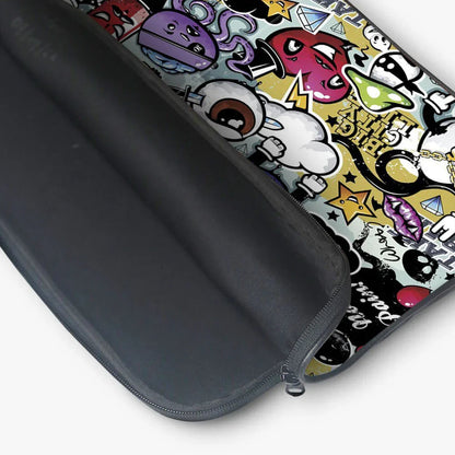 Colorful 13-inch laptop sleeve with cartoon graffiti design and a black zipper opening