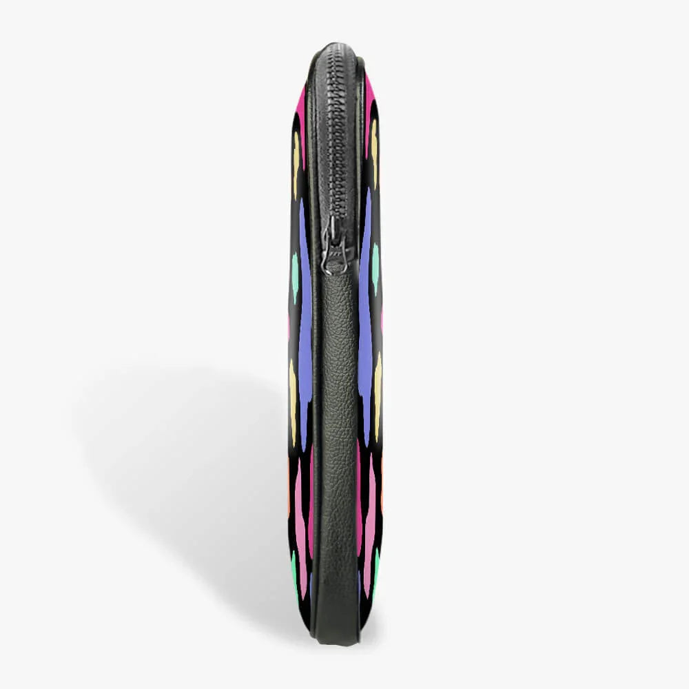 Slim black 13-inch laptop sleeve with colorful abstract pattern, side zipper view