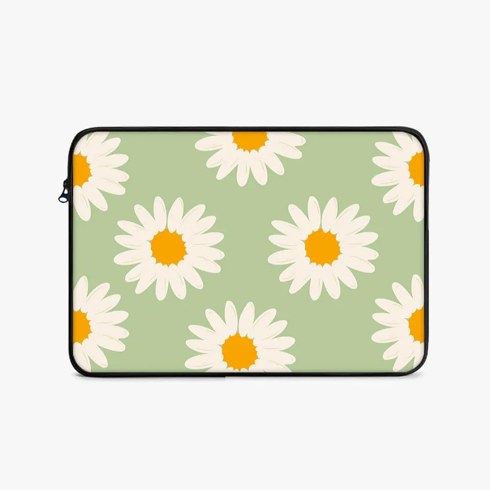 Green laptop sleeve with white daisy floral pattern and zippered edge, 17-inch size