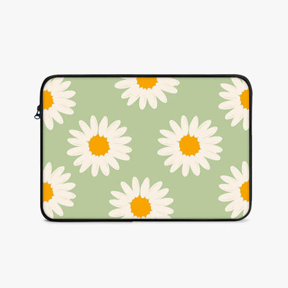 Green laptop sleeve with white daisy floral pattern and zippered edge, 17-inch size