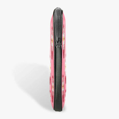 Pink laptop sleeve with zipper, cartoon daisy flower pattern, side view