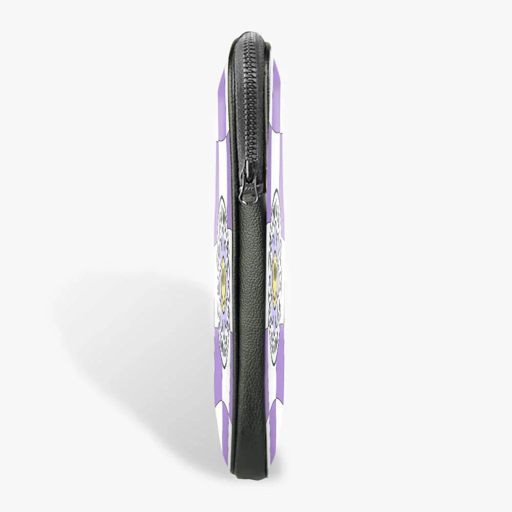 Slim purple and black laptop sleeve with zipper closure, side view