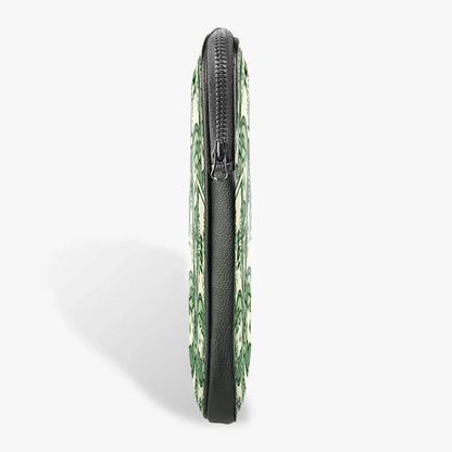 Side view of a black 13-inch laptop sleeve with green ornate pattern and zipper closure