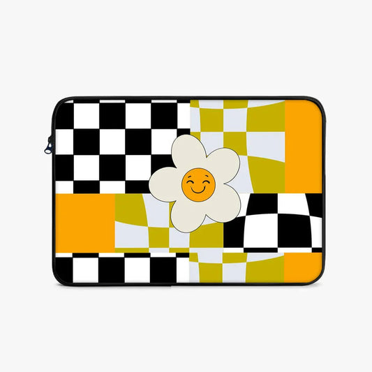 17-inch laptop sleeve with black, yellow, and white checkered pattern and smiling flower design