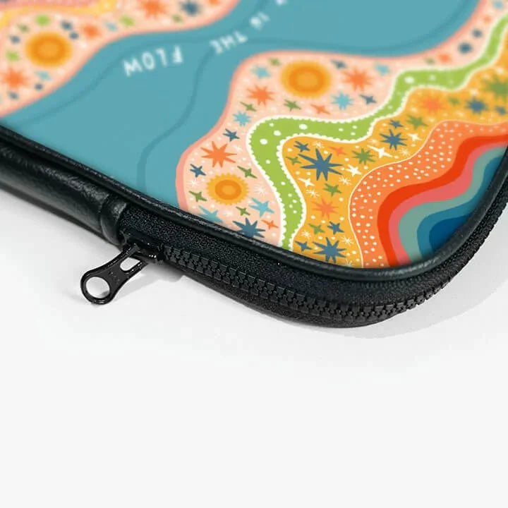 Colorful 13-inch laptop sleeve with zipper and abstract wavy floral pattern