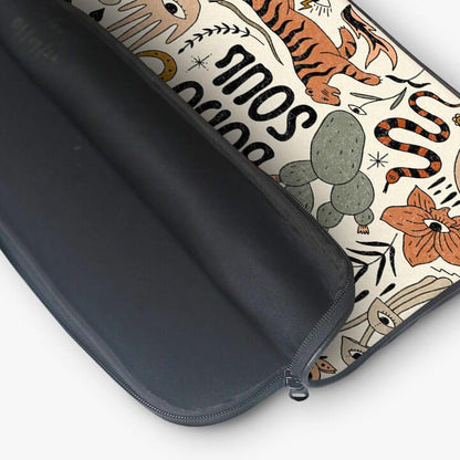 13-inch laptop sleeve with zip pouch, featuring colorful tiger, snake, and floral patterns