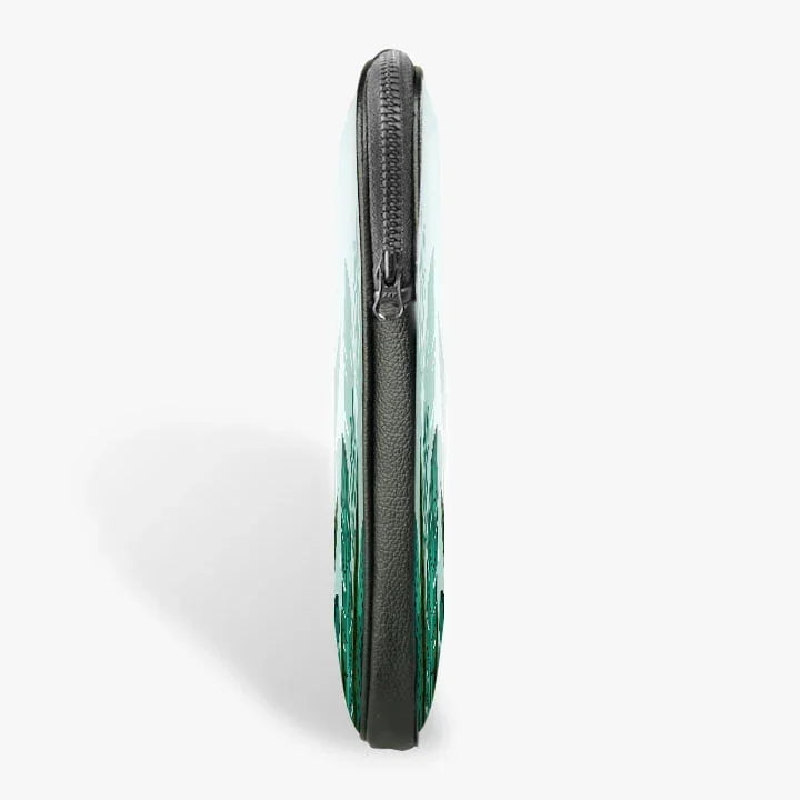 Side view of slim 13-inch laptop sleeve with zipper closure, green abstract design