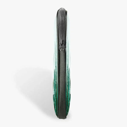 Side view of slim 13-inch laptop sleeve with zipper closure, green abstract design