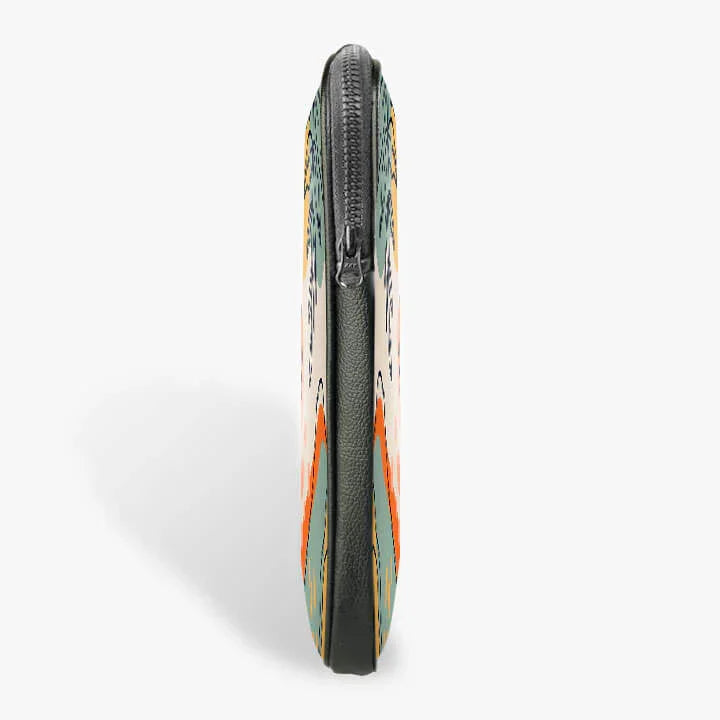 Slim 13-inch laptop sleeve with zipper, colorful printed fabric, side view