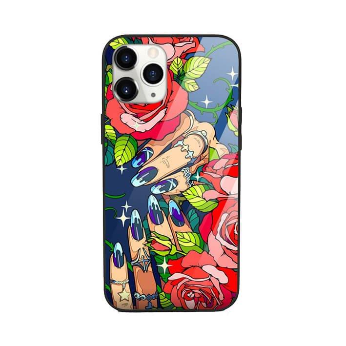 Pop art phone case with illustrated hands, blue nails, red roses, green leaves and star accents
