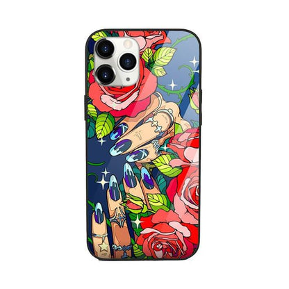 Pop art phone case with illustrated hands, blue nails, red roses, green leaves and star accents