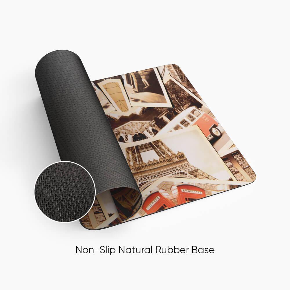 Non-slip desk mat with travel-themed vintage photography and natural rubber base
