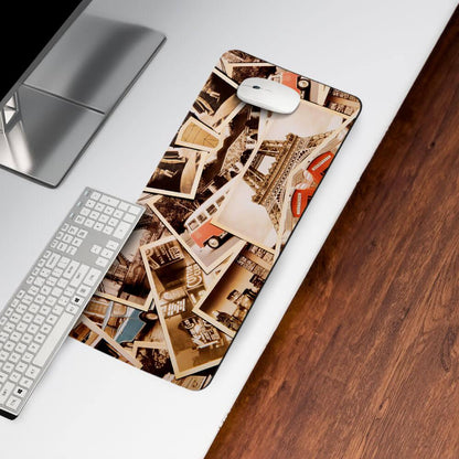 Vintage travel-themed desk mat with city landmarks, mouse, and keyboard on white desk