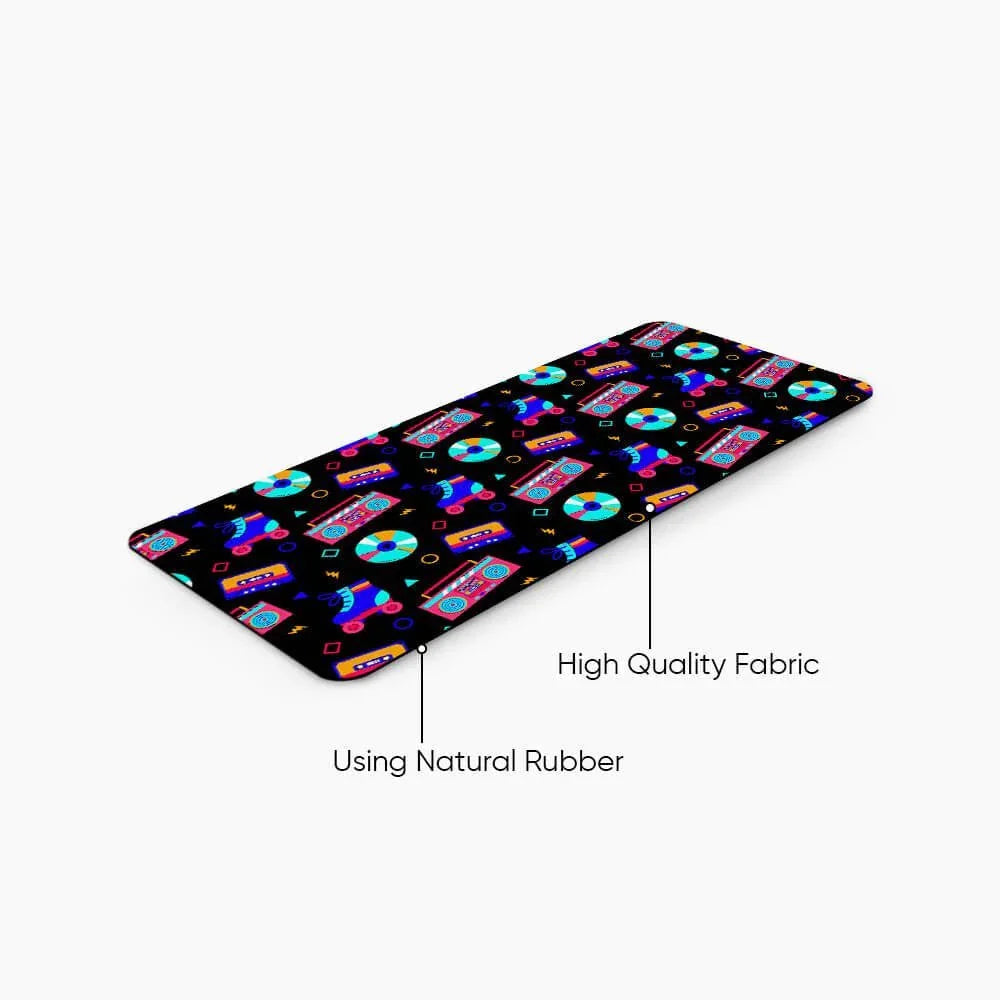 Colorful desk mat with vintage cassette, boombox, and geometric pattern, natural rubber base