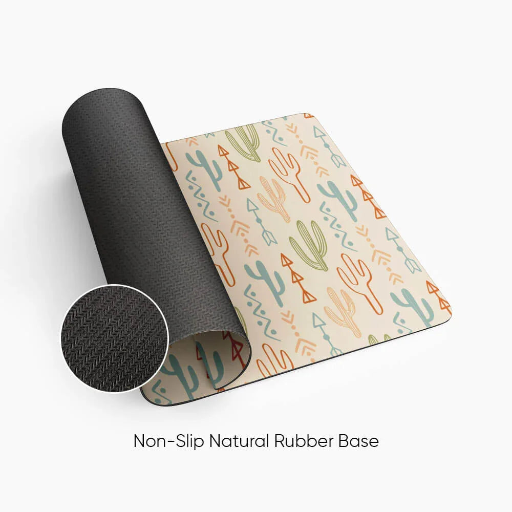 Desk mat with colorful cactus pattern and non-slip natural rubber base.