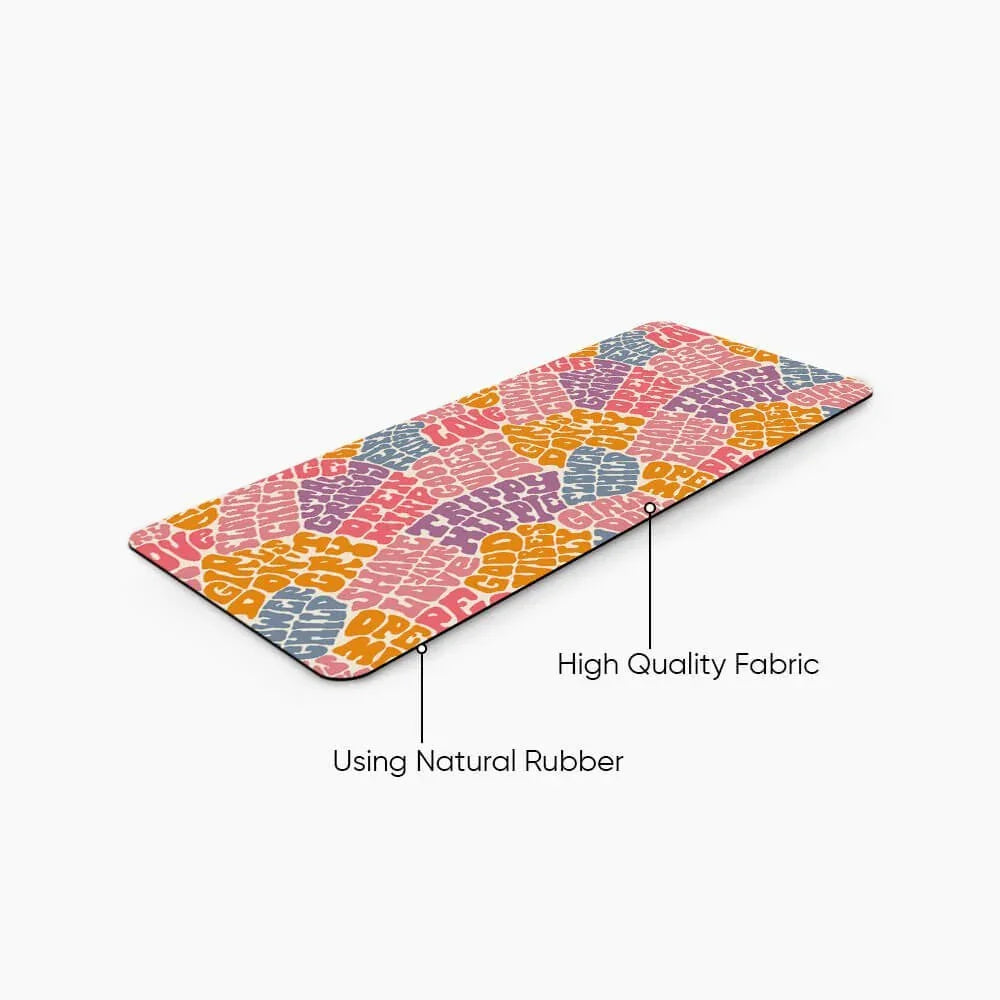 Colorful desk mat with groovy text pattern, natural rubber base, high quality fabric top