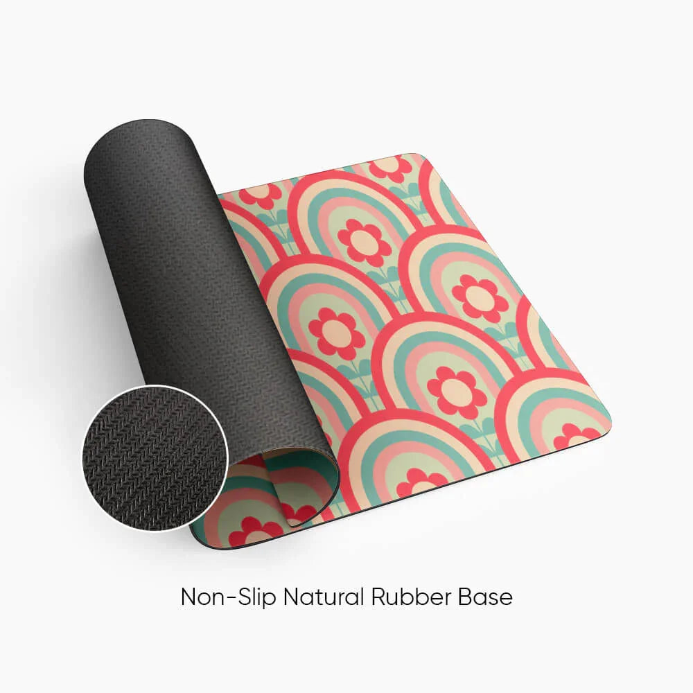 Colorful desk mat with retro floral pattern, non-slip natural rubber base visible