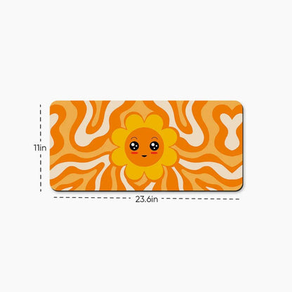 Cute orange desk mat with a smiling flower, wavy pattern, 23.6 x 11 inches