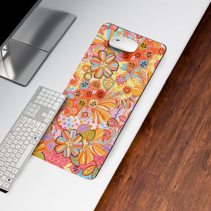 Colorful floral desk mat with keyboard and mouse on modern office desk
