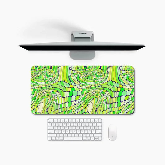 Large desk mat with vibrant green abstract pattern, placed under monitor, keyboard, and mouse