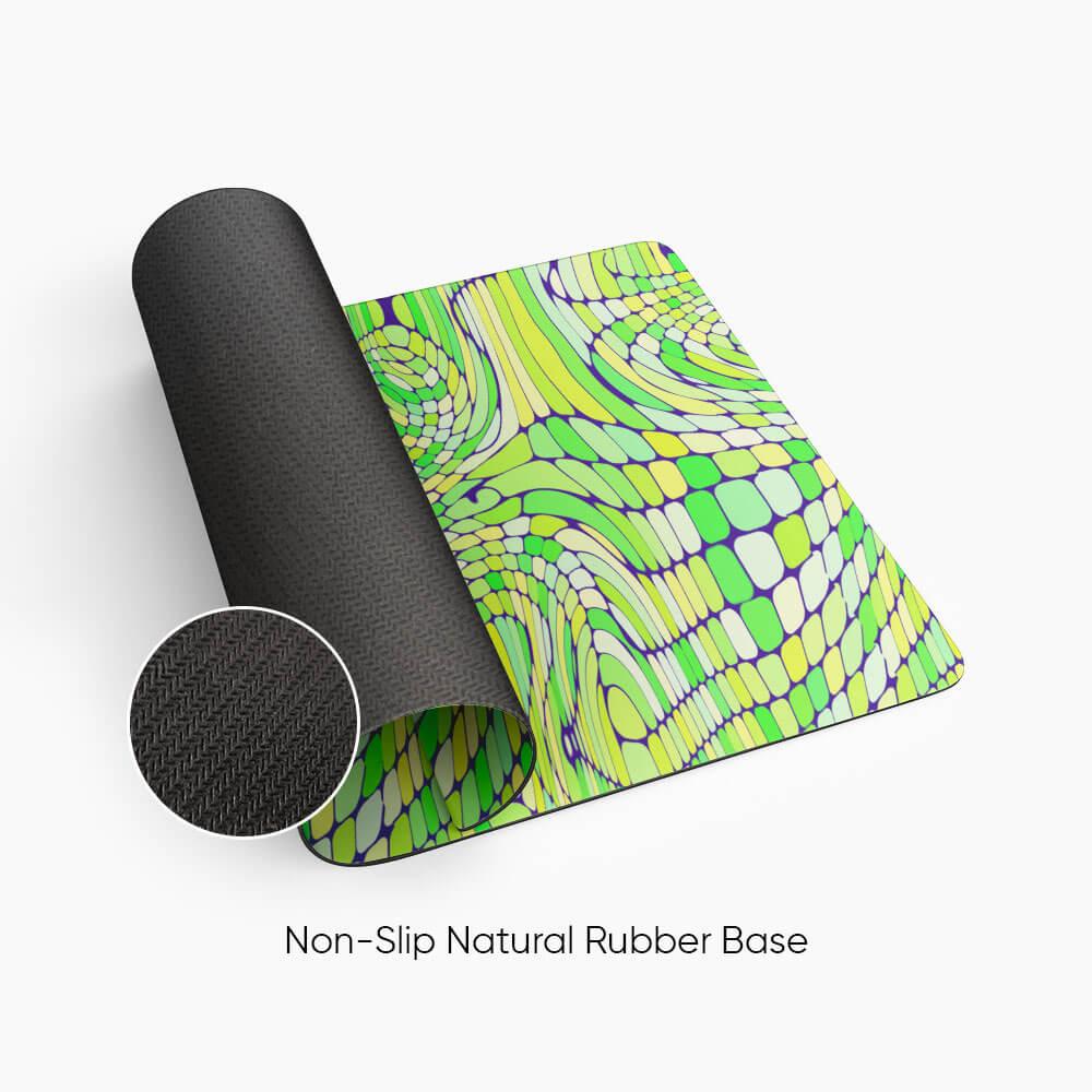 Colorful desk mat with abstract yellow and green pattern, non-slip natural rubber base
