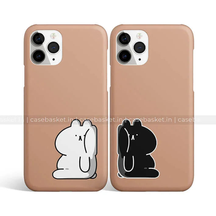 Brown phone cases with cute white and black cartoon bunny design for couples