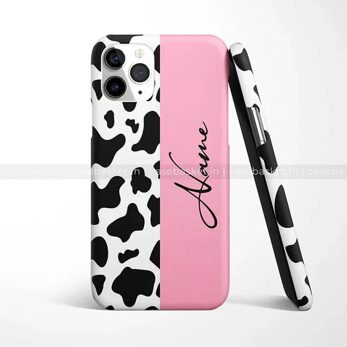Pink and black cow print phone case with cursive text design, modern protective cover