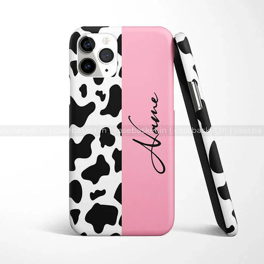 Pink and black cow print phone case with cursive text design, modern protective cover
