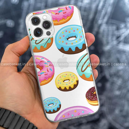 Hand holding phone with colorful donut print case, fun mobile cover design