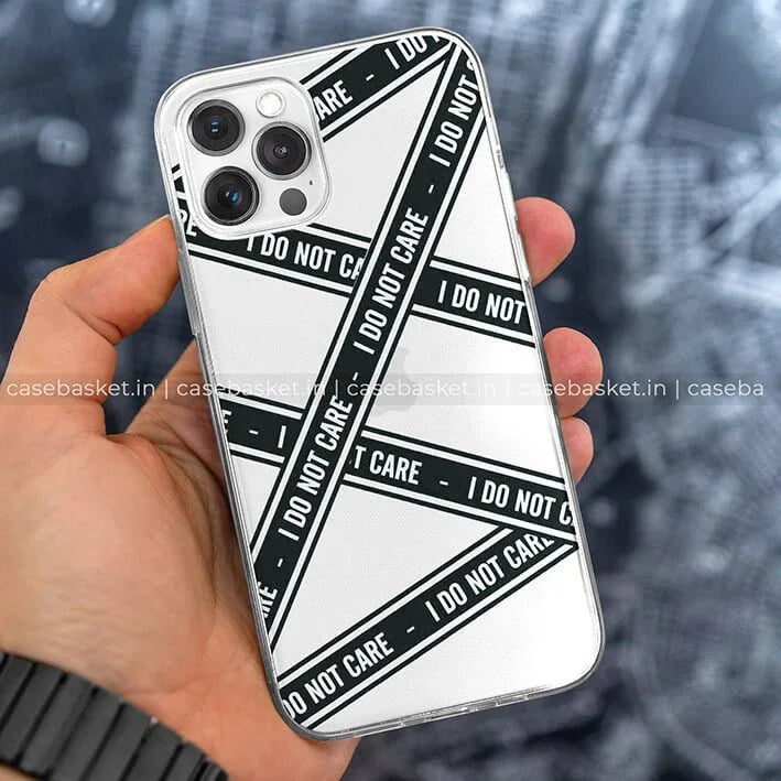 White smartphone case with black diagonal stripes reading 'I DO NOT CARE' held in hand