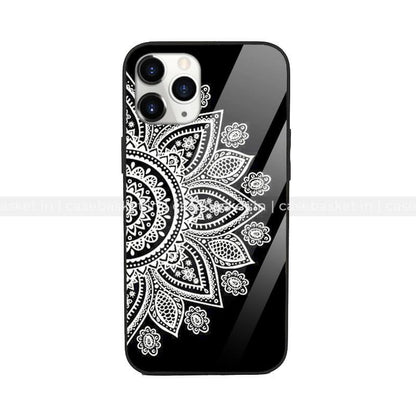 Black glass mobile phone case with white mandala floral design, protective back cover