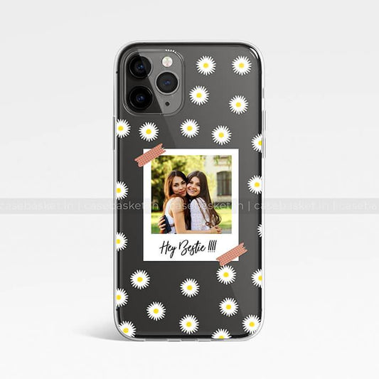 Black phone case with white daisy pattern and Polaroid photo design, text 'Hey Bestie'